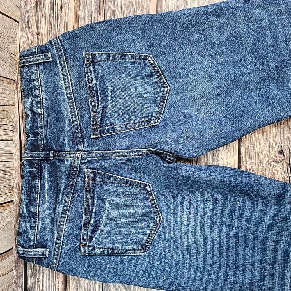 NEW FREE PEOPLE MID-RISE DISTRESSED RAW TIERED HEM FLARE LEG DENIM BLUE JEANS - Picture 4 of 12